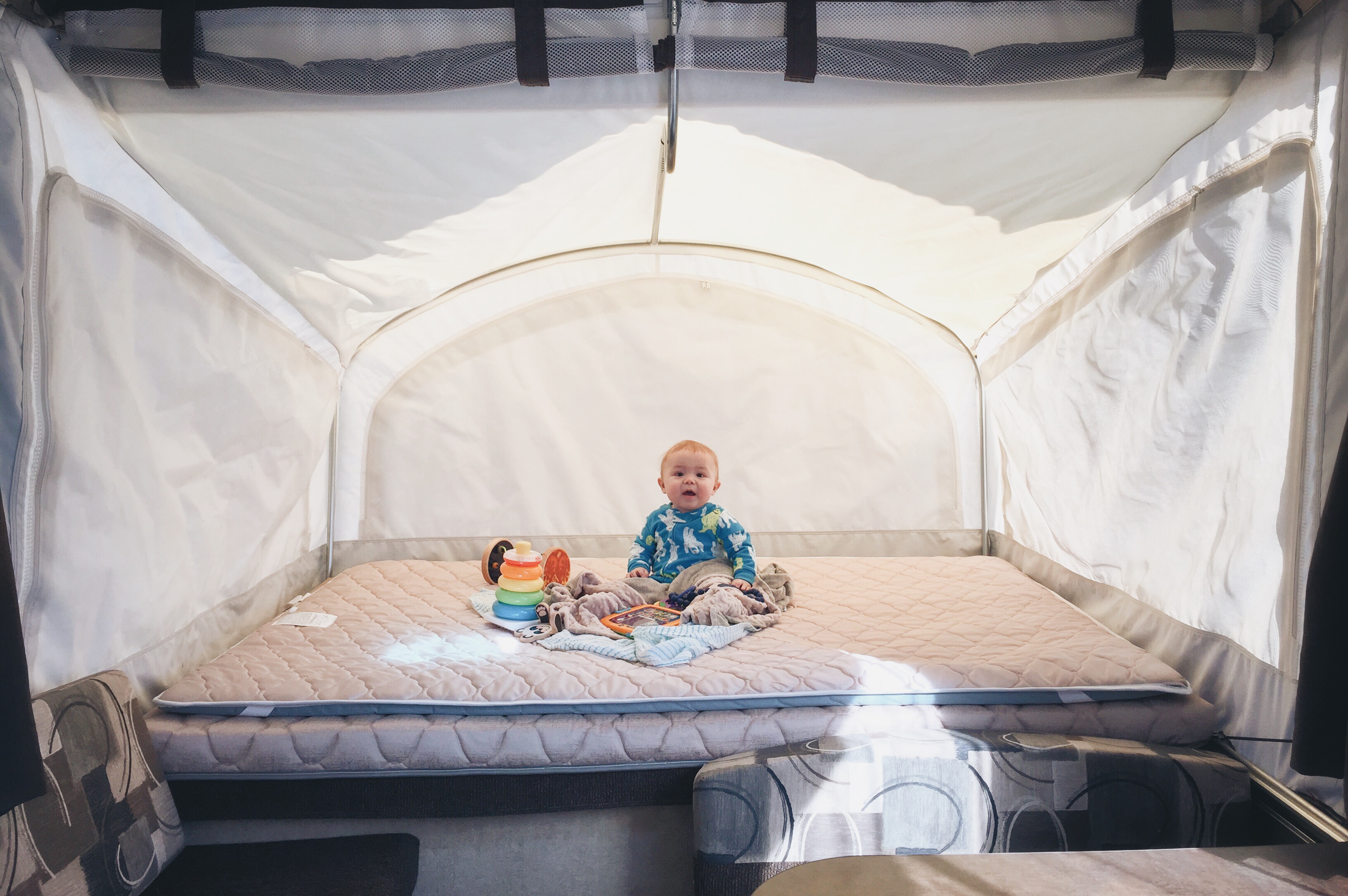Owen - 8 Months old - checking out his bunk.